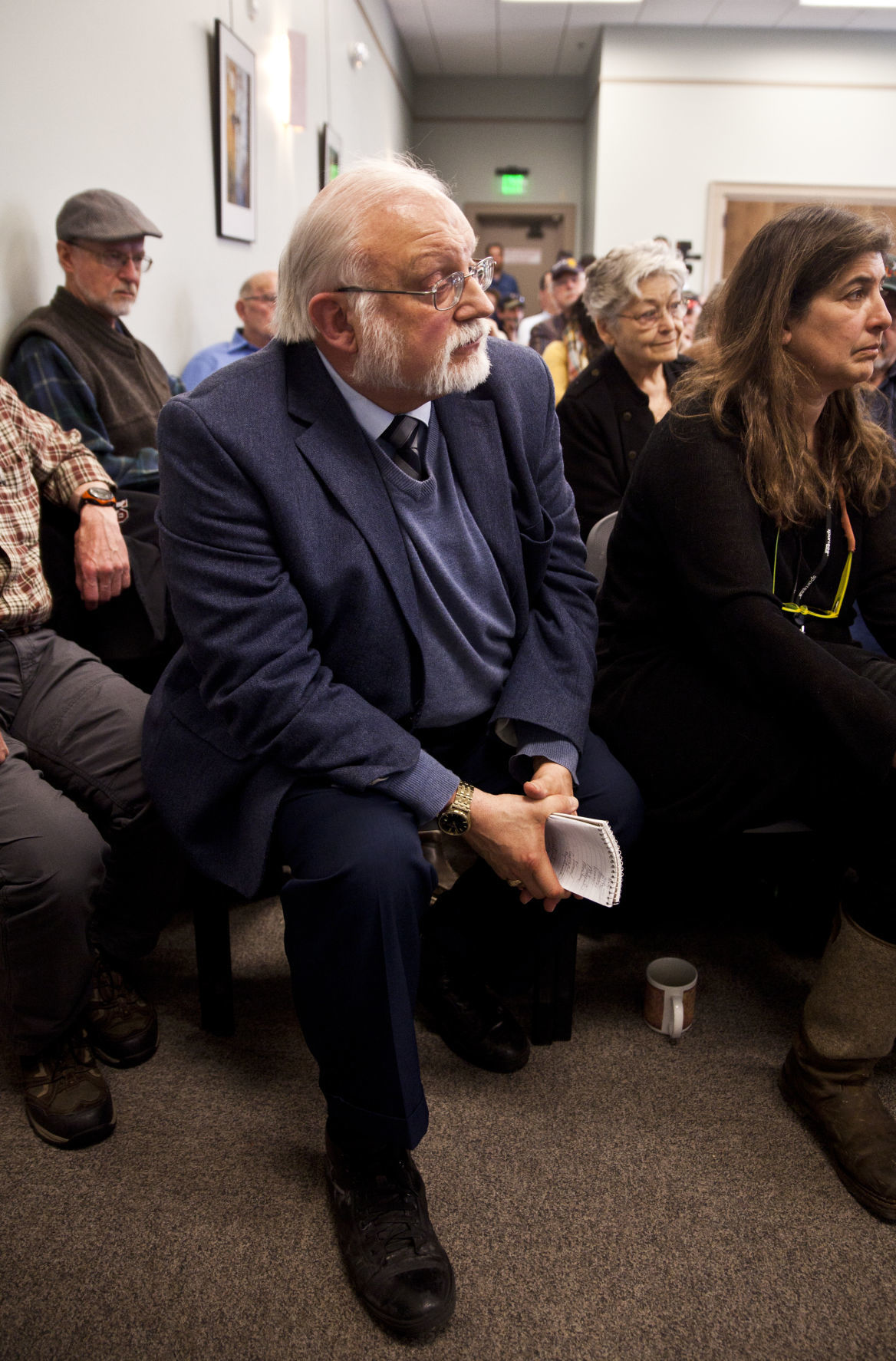 Dr. John Ray, a public policy professor at Montana Tech listens to a response